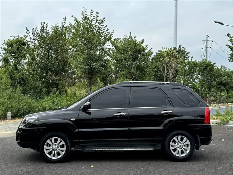 Kia Sportage — фото 11