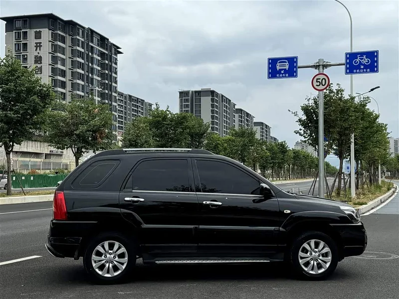 Kia Sportage — фото 12