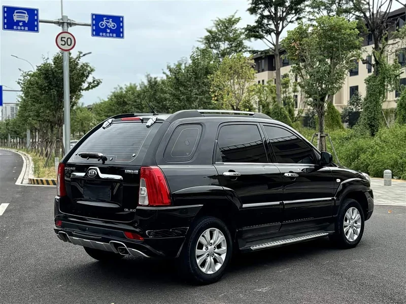 Kia Sportage — фото 13