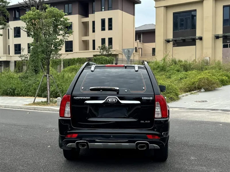 Kia Sportage — фото 14