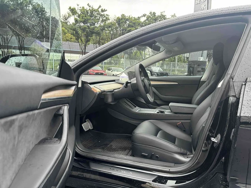 Tesla Model 3 — фото 11