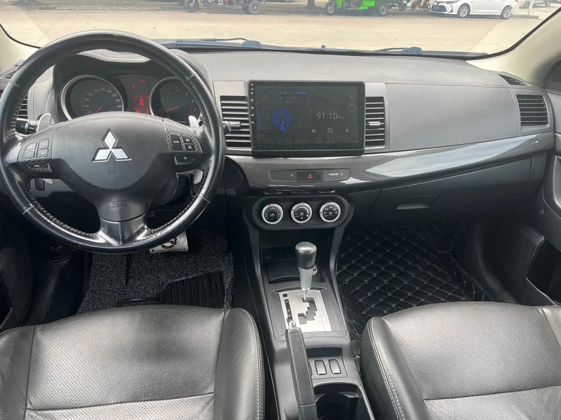 Mitsubishi Lancer EX — фото 7