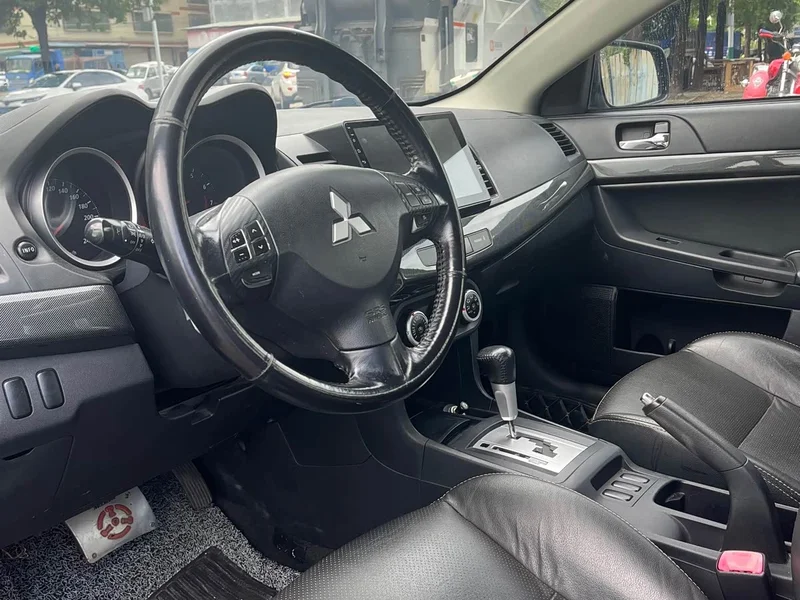 Mitsubishi Lancer EX — фото 8