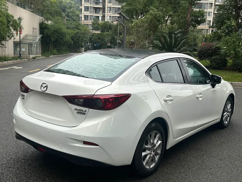 Mazda 3 Axela — фото 4