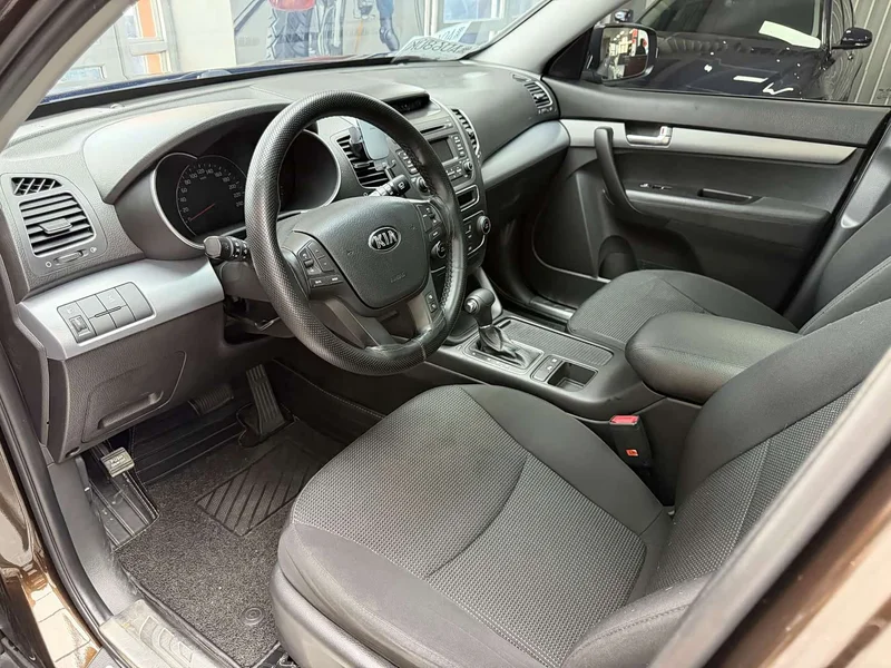 Kia Sorento — фото 10