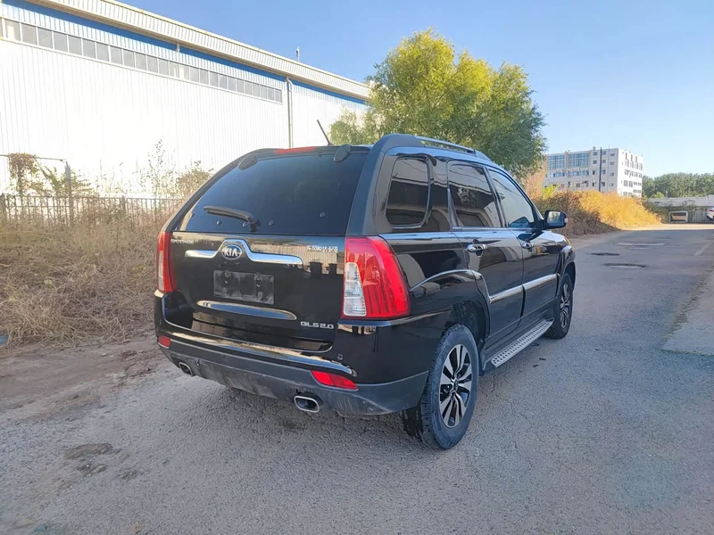 Kia Sportage — фото 10
