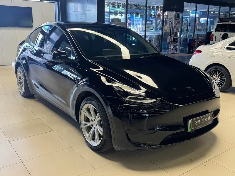 Tesla Model Y — фото 12