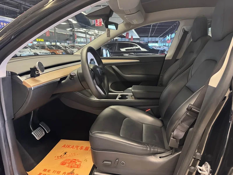 Tesla Model Y — фото 16