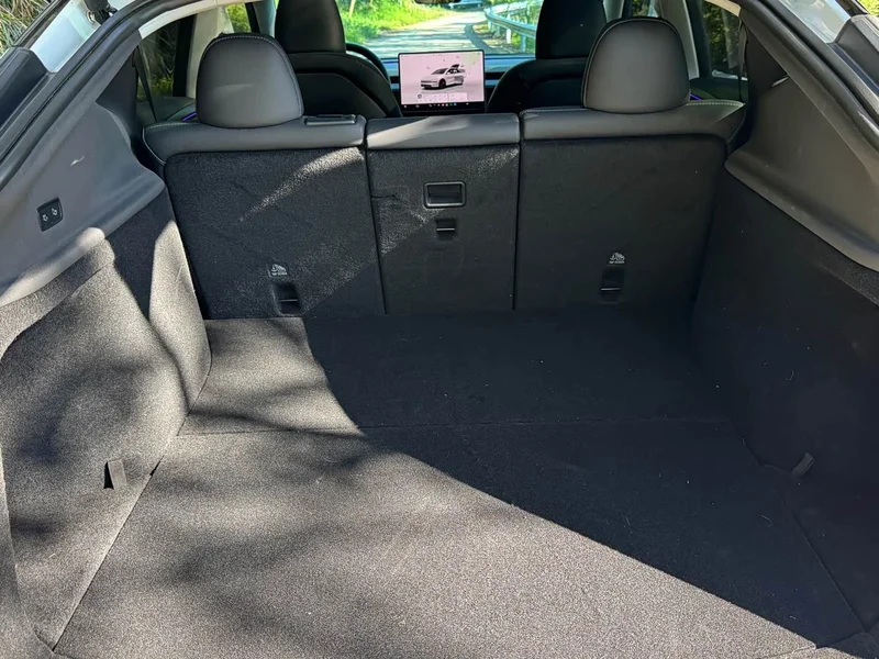 Tesla Model Y — фото 12