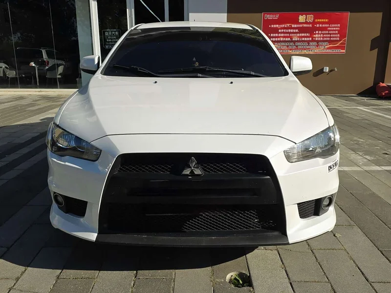 Mitsubishi Lancer EX — фото 1
