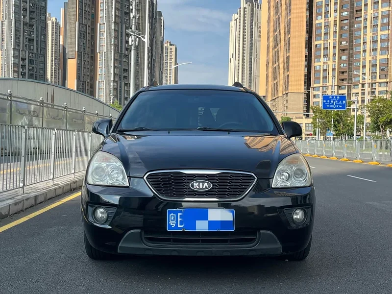 Kia Carens — фото 2