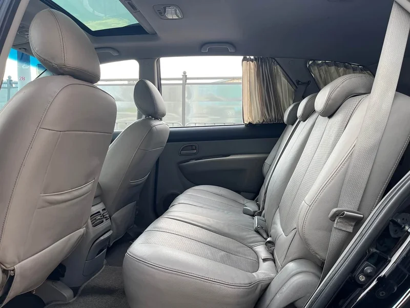 Kia Carens — фото 10