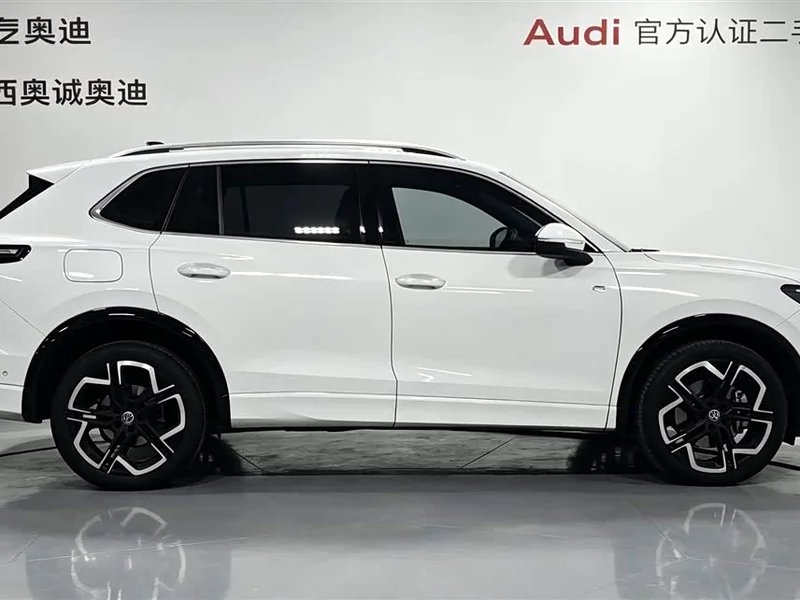 Volkswagen Tiguan L — фото 3