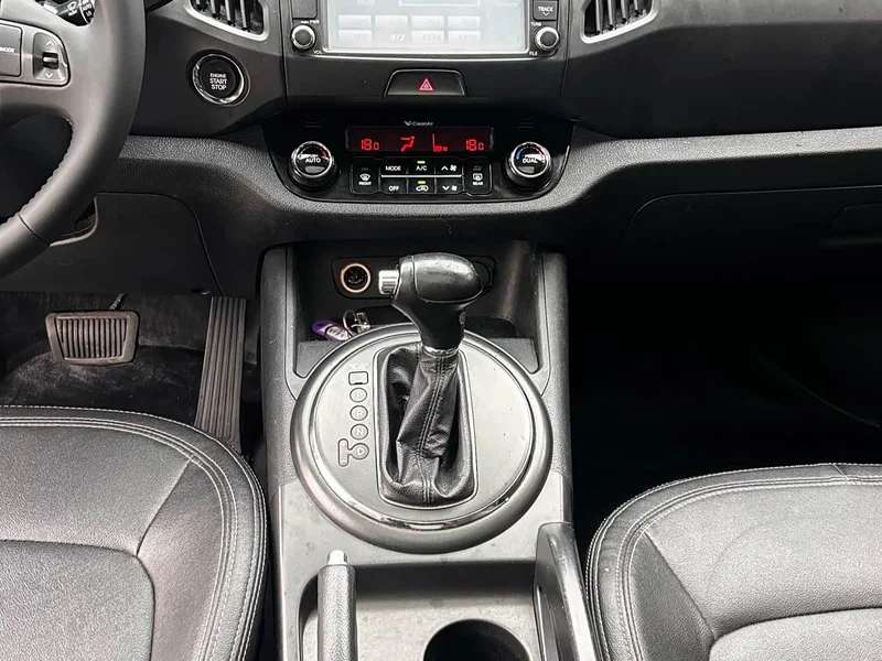 Kia Sportage — фото 11