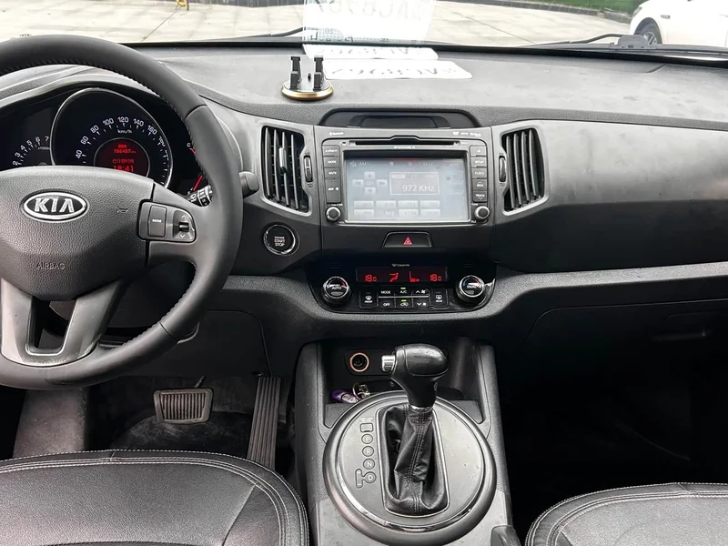 Kia Sportage — фото 13
