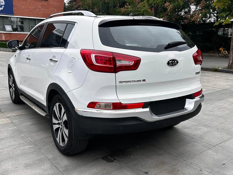 Kia Sportage — фото 7