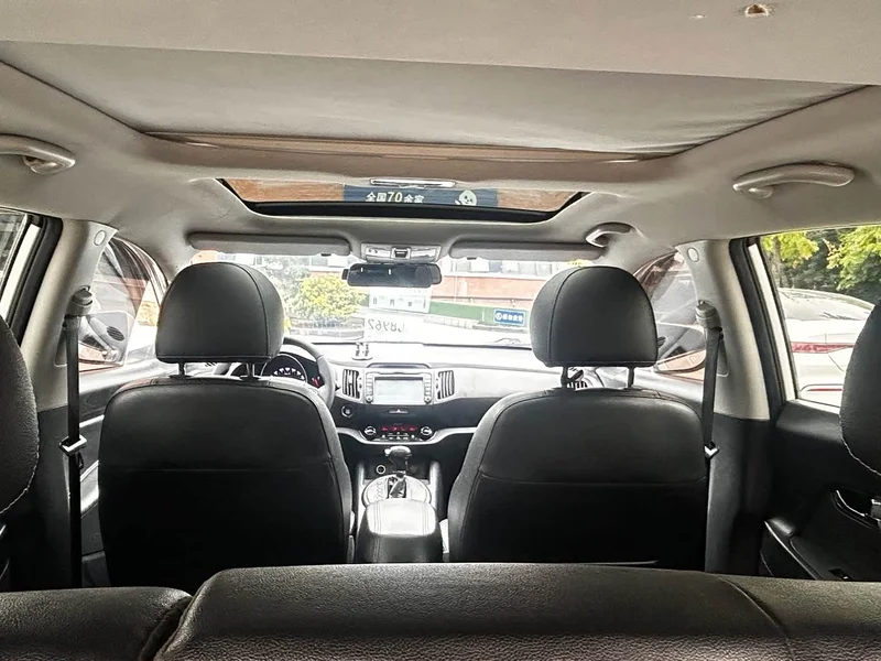 Kia Sportage — фото 8