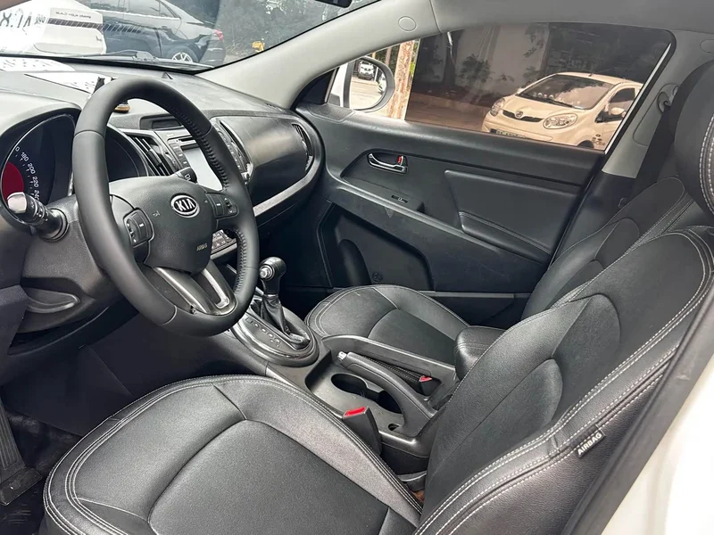 Kia Sportage — фото 10
