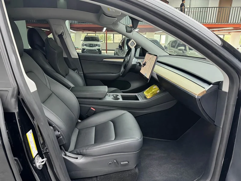 Tesla Model Y — фото 10