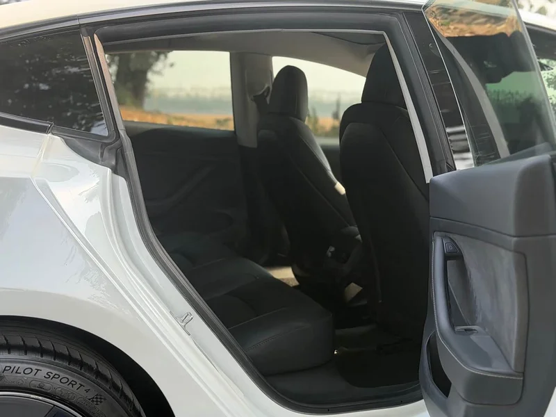 Tesla Model 3 — фото 11