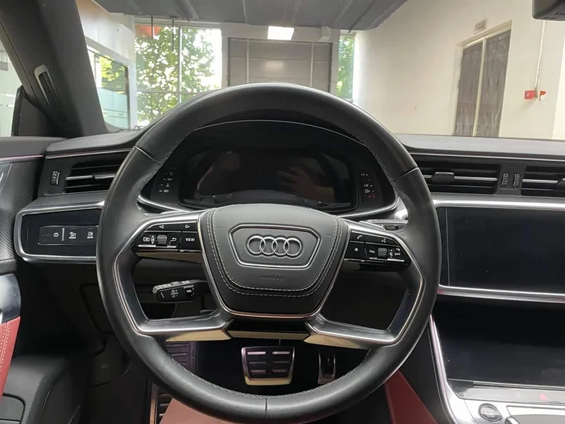 Audi A7L — фото 12
