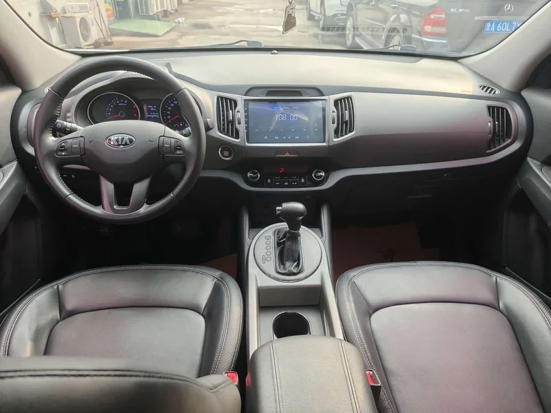Kia Sportage — фото 11