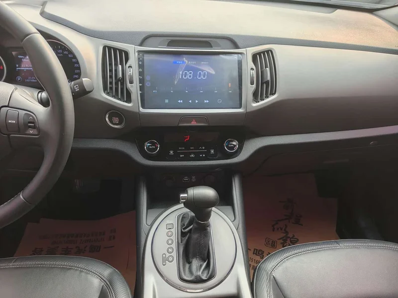 Kia Sportage — фото 12