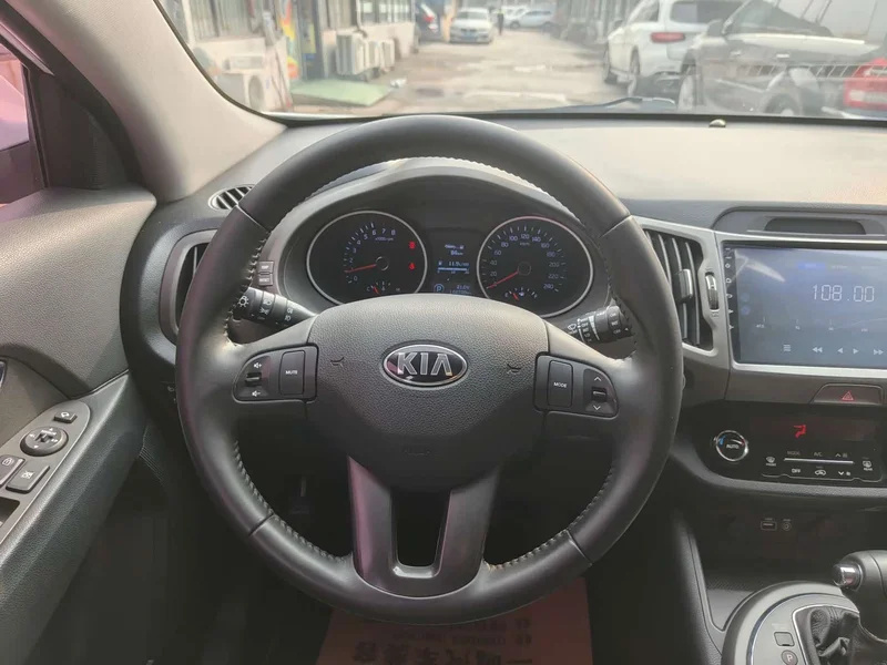Kia Sportage — фото 13