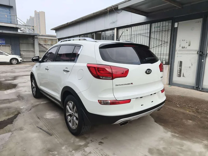 Kia Sportage — фото 15