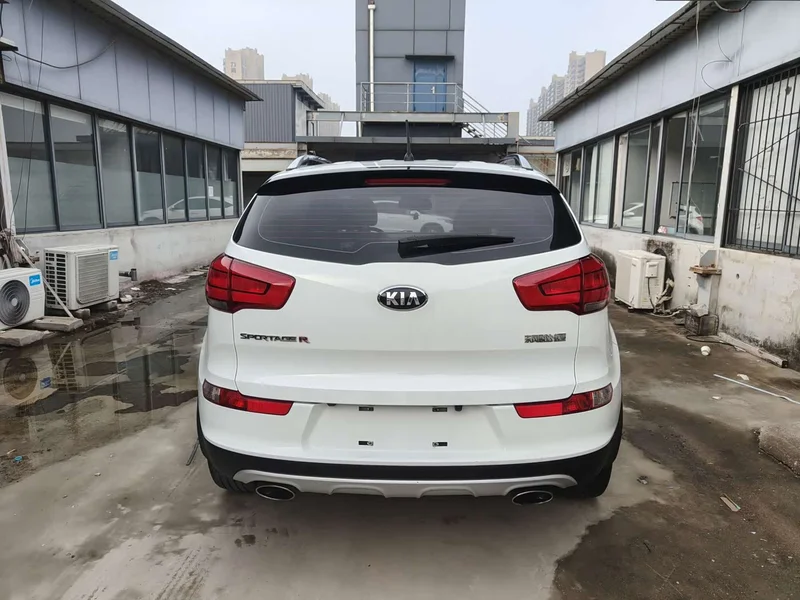 Kia Sportage — фото 16