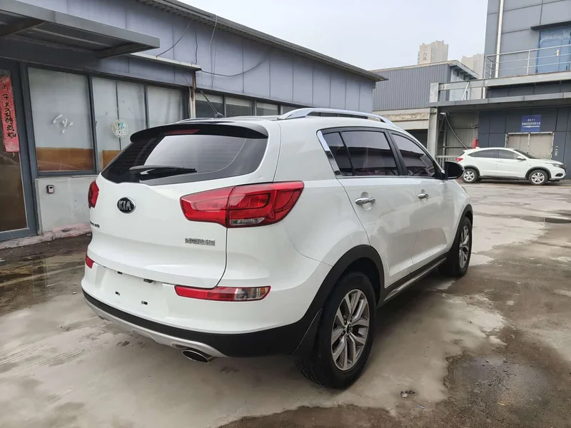 Kia Sportage — фото 17