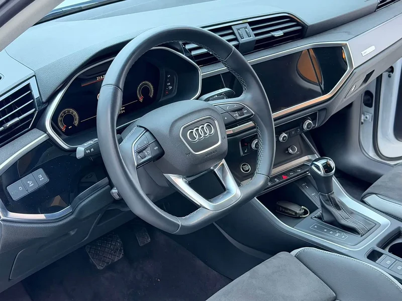 Audi Q3 — фото 11