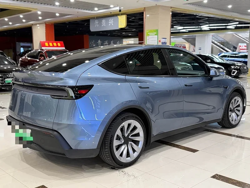 Tesla Model Y — фото 7