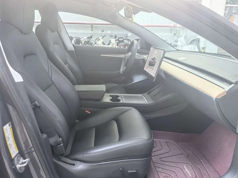 Tesla Model 3 — фото 17