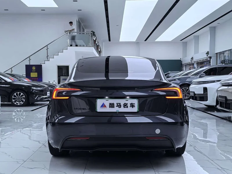 Tesla Model 3 — фото 14