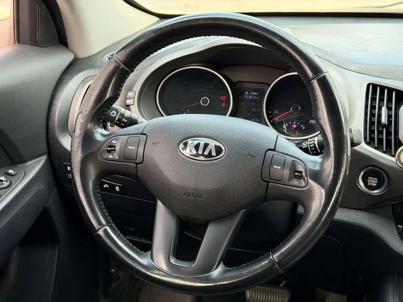 Kia Sportage — фото 9