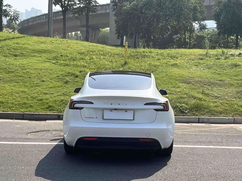 Tesla Model 3 — фото 11