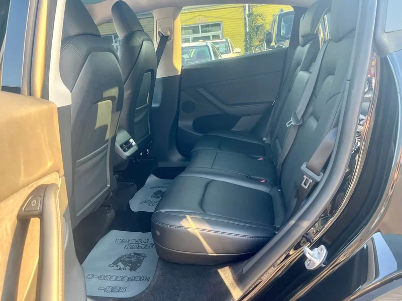 Tesla Model Y — фото 14
