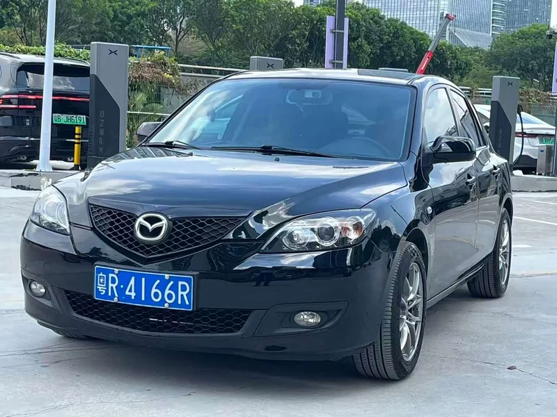 Mazda 3 — фото 1