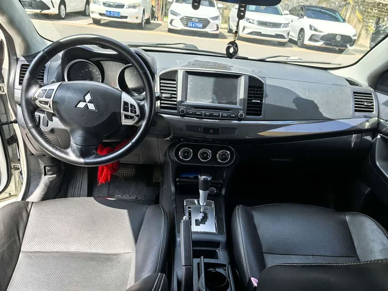 Mitsubishi Lancer EX — фото 6