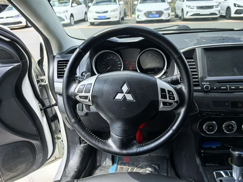 Mitsubishi Lancer EX — фото 7