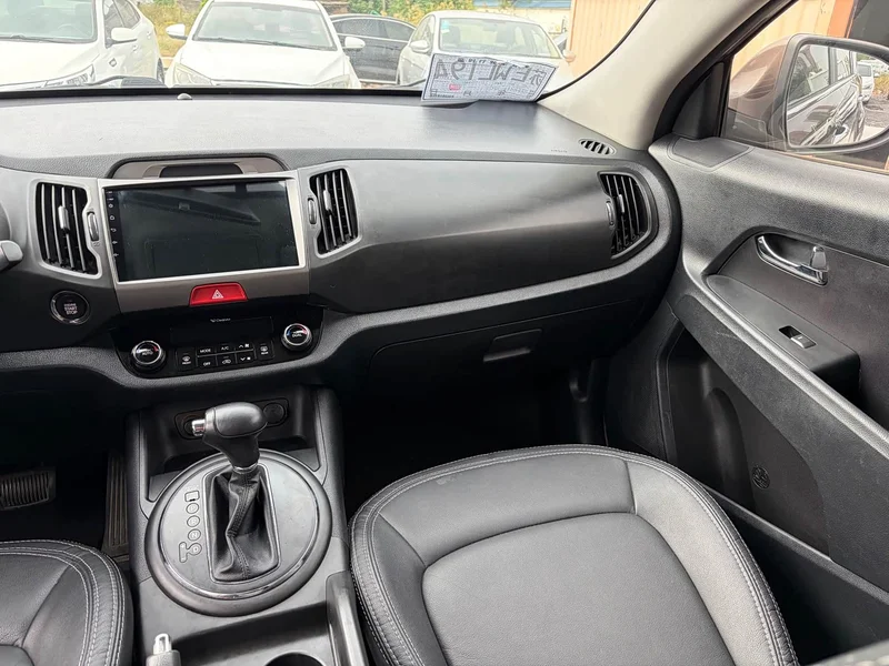 Kia Sportage — фото 12