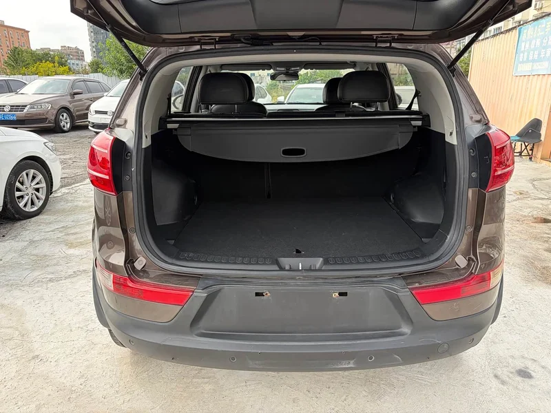 Kia Sportage — фото 13