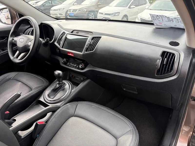 Kia Sportage — фото 15