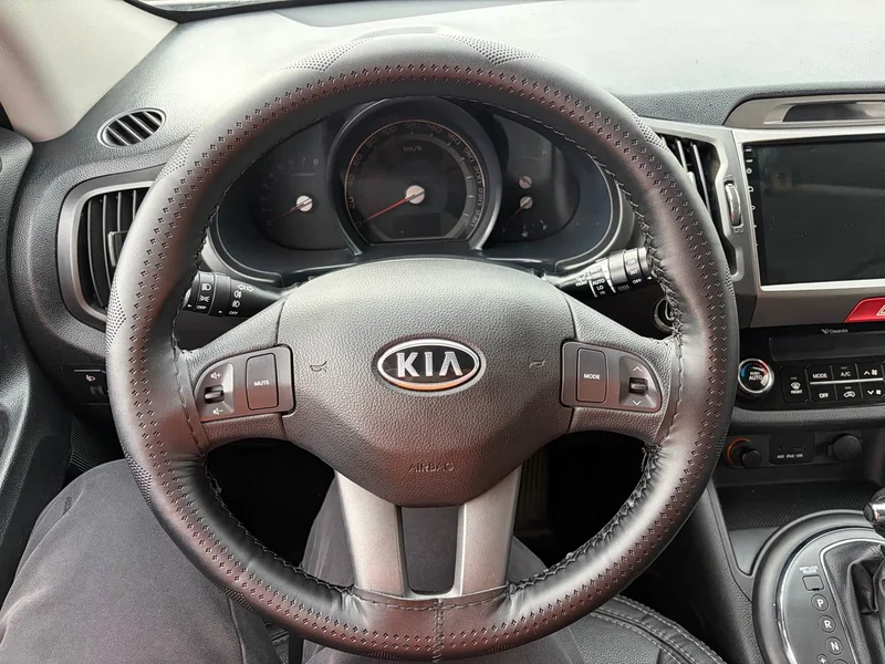 Kia Sportage — фото 19