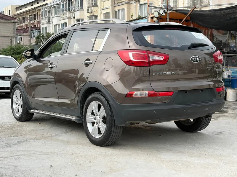 Kia Sportage — фото 7