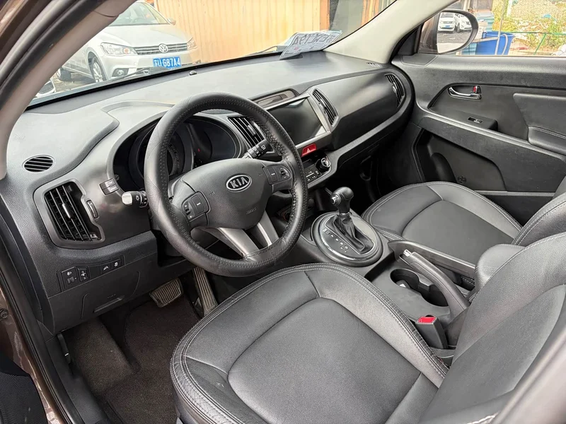 Kia Sportage — фото 8
