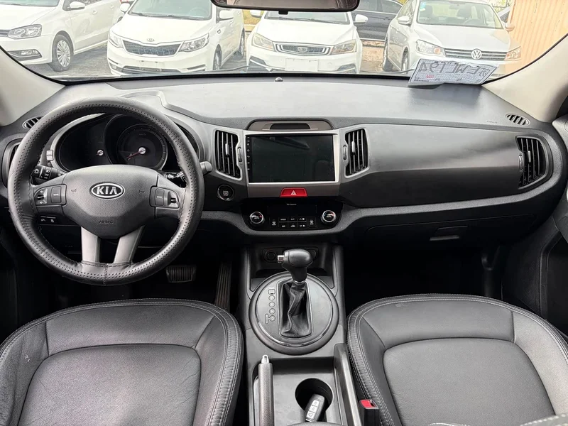 Kia Sportage — фото 10