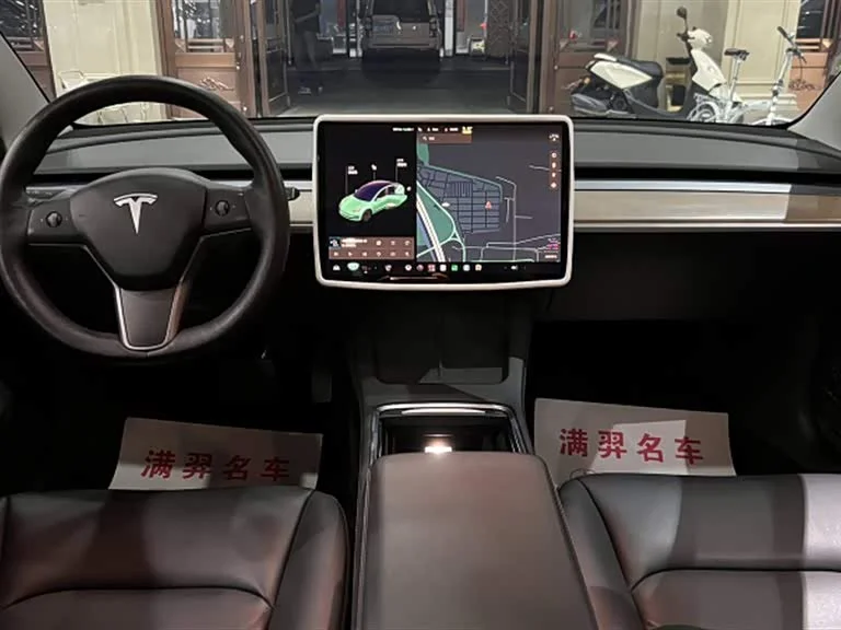Tesla Model 3 — фото 18