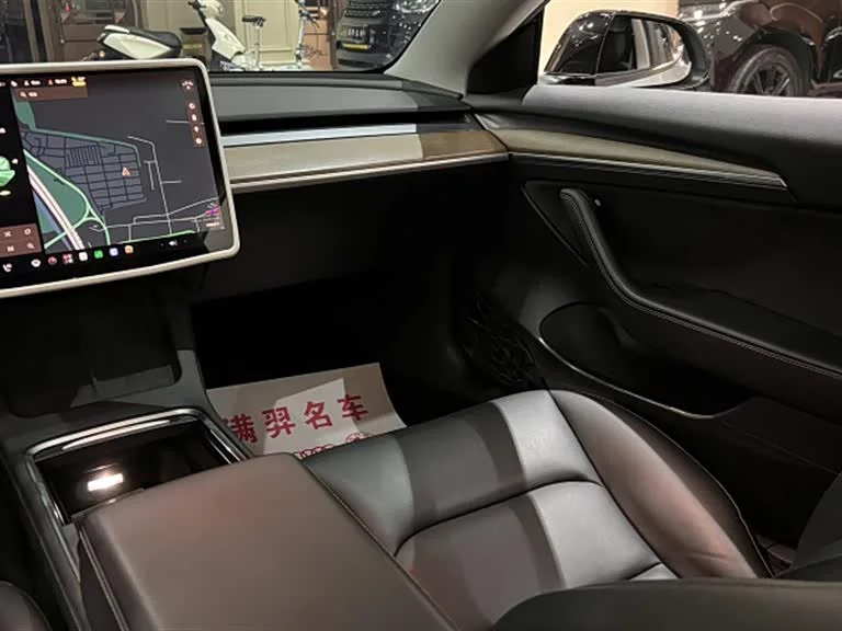 Tesla Model 3 — фото 20
